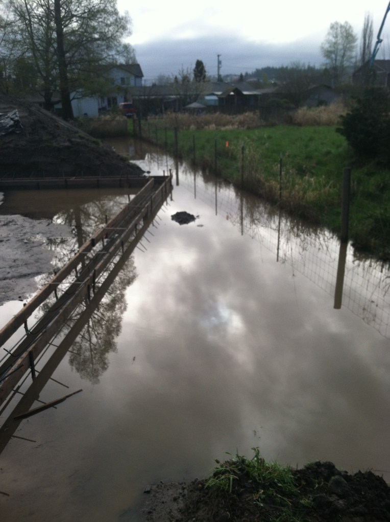 After our foundation forms were finished, a heavy rain came through the area.